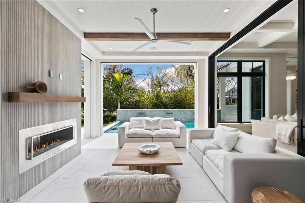 Open to the Entire Main Living, this Outside Living has screens for use in the evening and Storm Shutters for Rain and Storm Protection