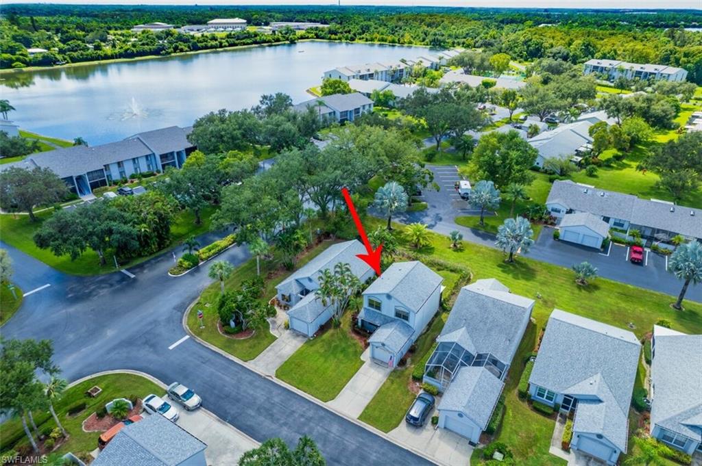 Drone / aerial view of property and community