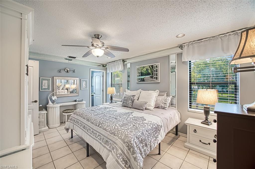 Primary Bedroom featuring multiple windows for great lighting