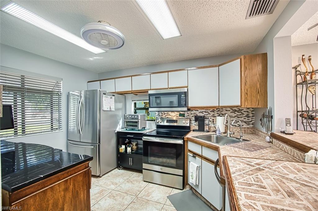 Stainless steel appliances with a healthy amount of sunlight