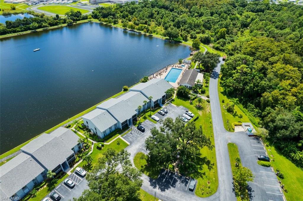 Bird's eye view of community and heated pool overlooking the lake