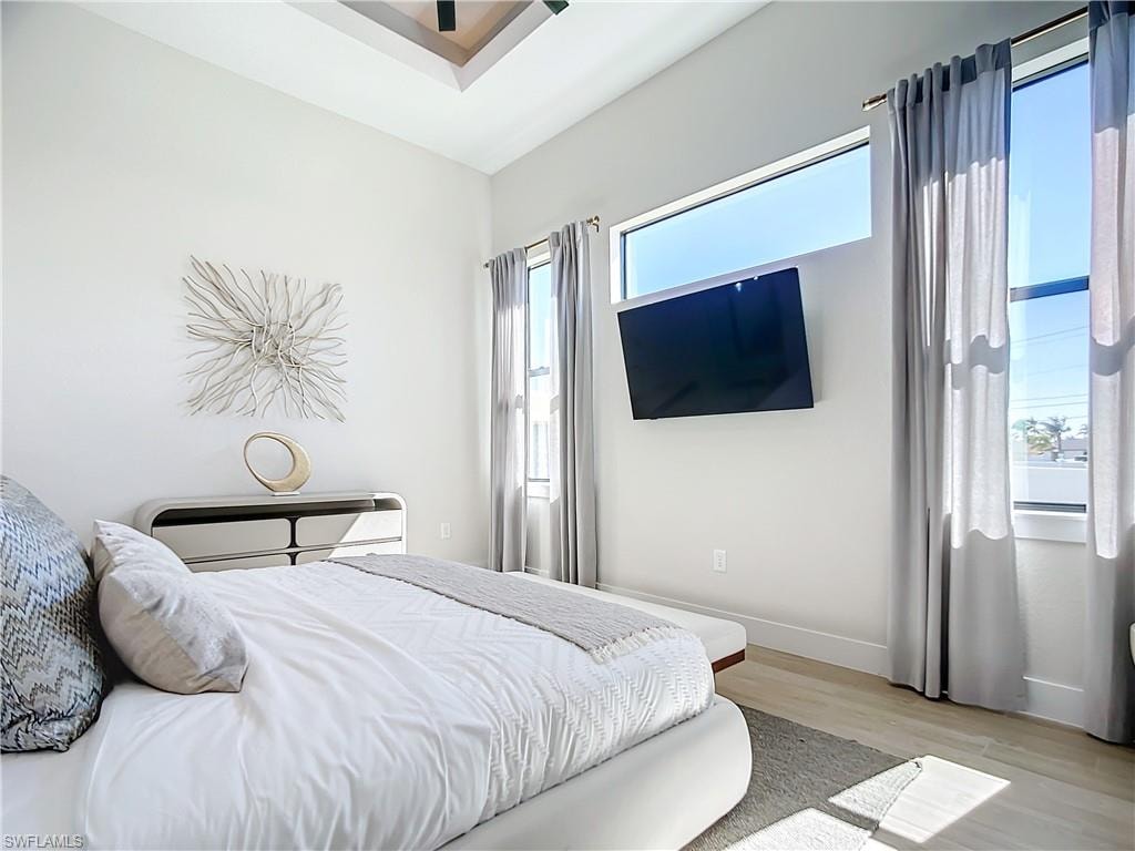 Bedroom with light wood-type flooring