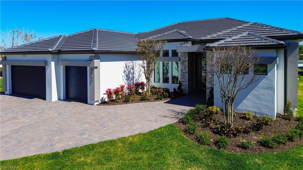 View of front of home with a garage