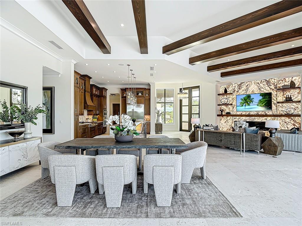From every angle the great room is super impressive.  Notice the shell stone tile throughout.