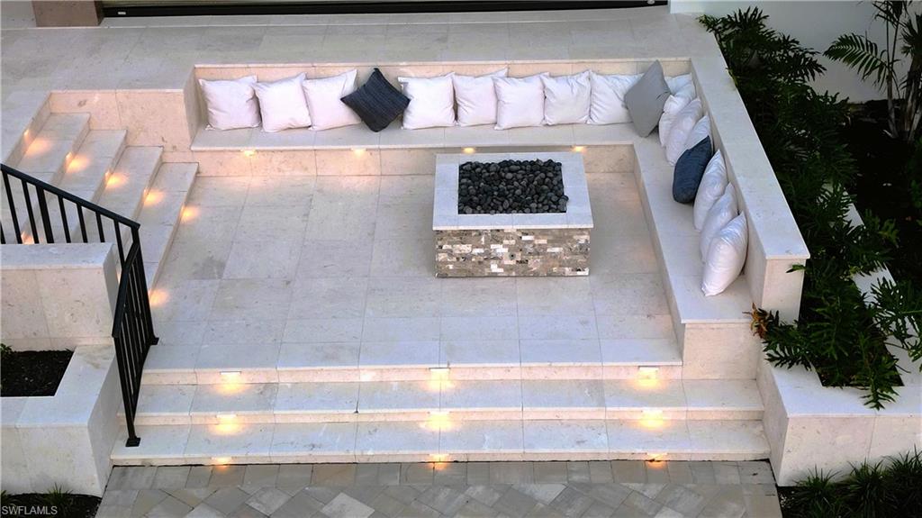Enjoy entertaining around the built in gas fireplace which has beautiful evening lighting.