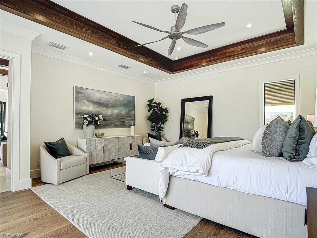 Large master suite featuring exquisite wood crown moulding.
