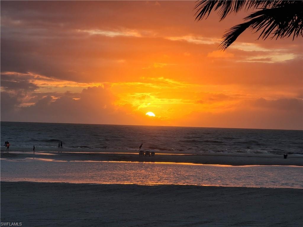 View of water feature featuring a beach view