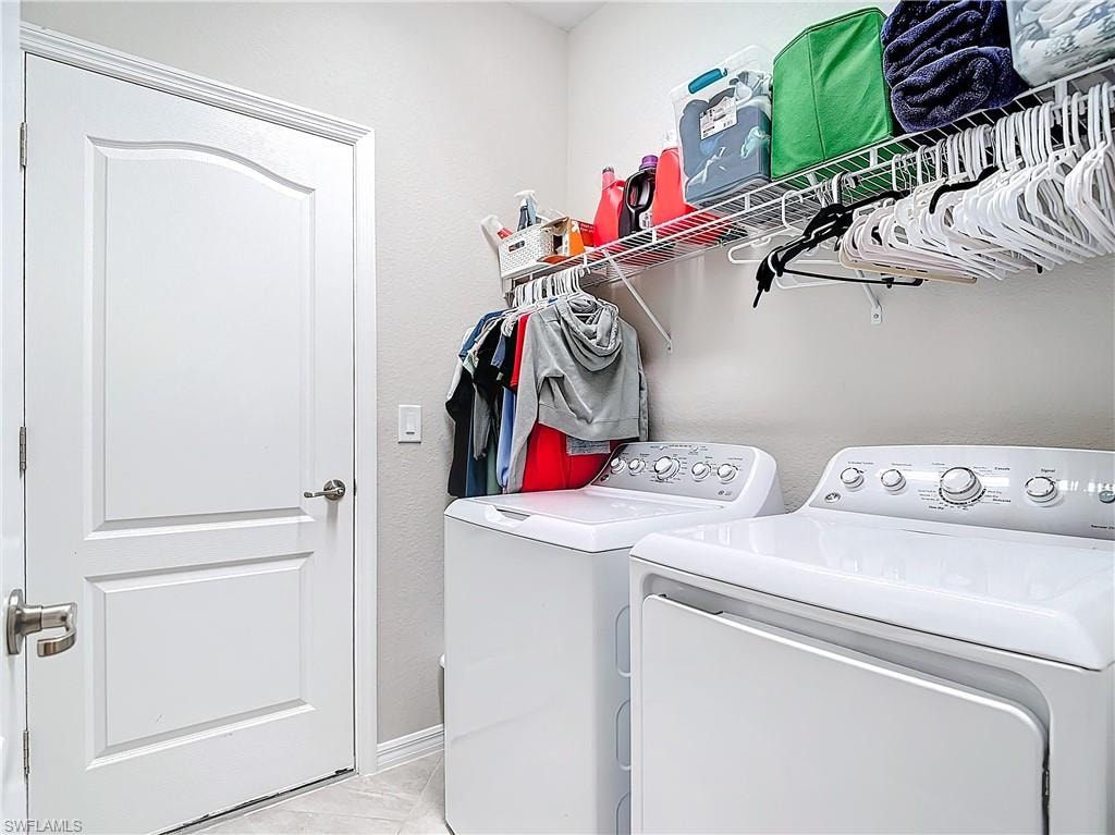 Laundry area featuring washing machine and dryer