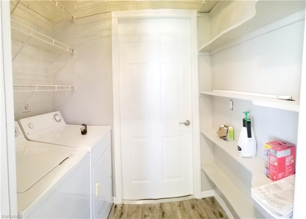Inside Laundry area with plank tile flooring