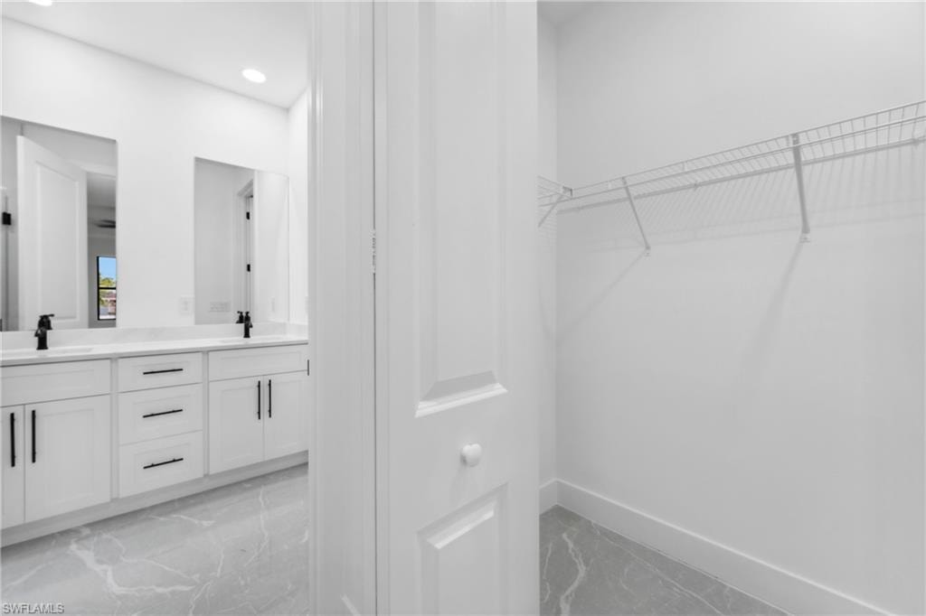 Walk in closet with sink