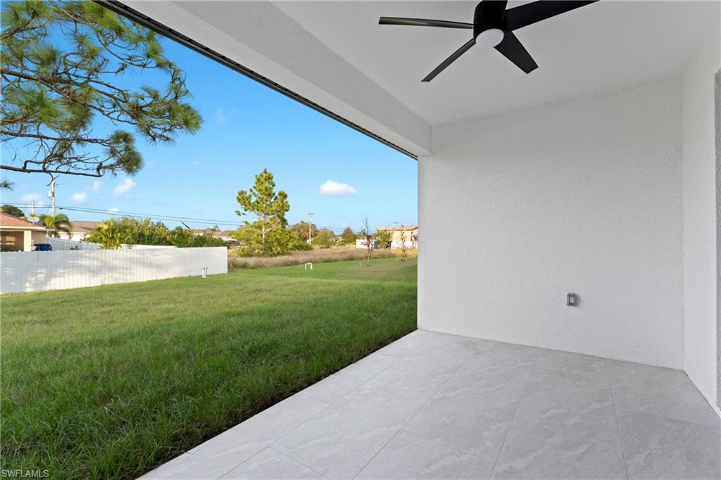 View of patio with ceiling fan