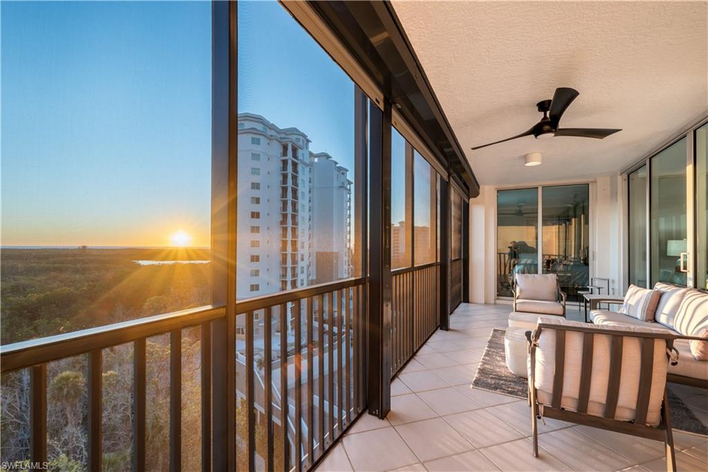 Sunroom featuring ceiling fan
