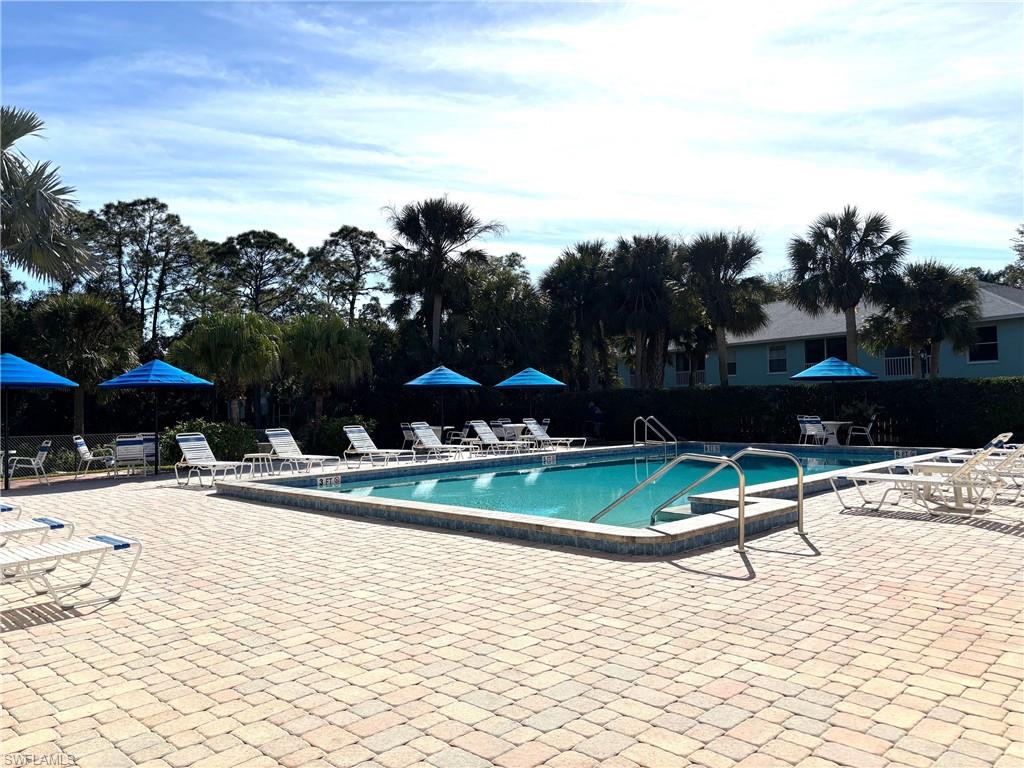 View of pool featuring a patio area