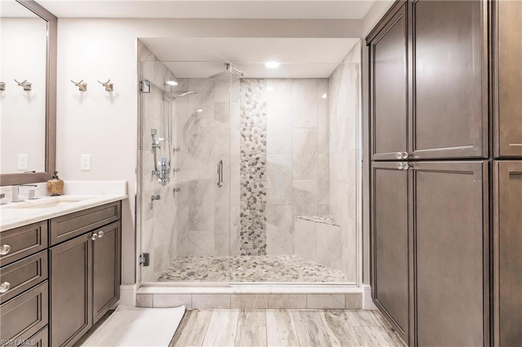 Bathroom with vanity and walk in shower