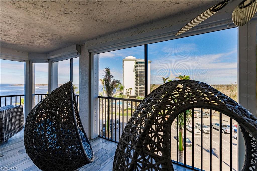 Unfurnished sunroom with a water view