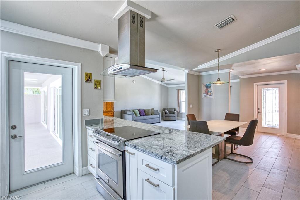 Kitchen door provides access to Lanai for indoor / outdoor cooking entertaining