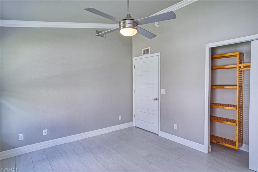 Front bedroom, beautiful wood closet shelves