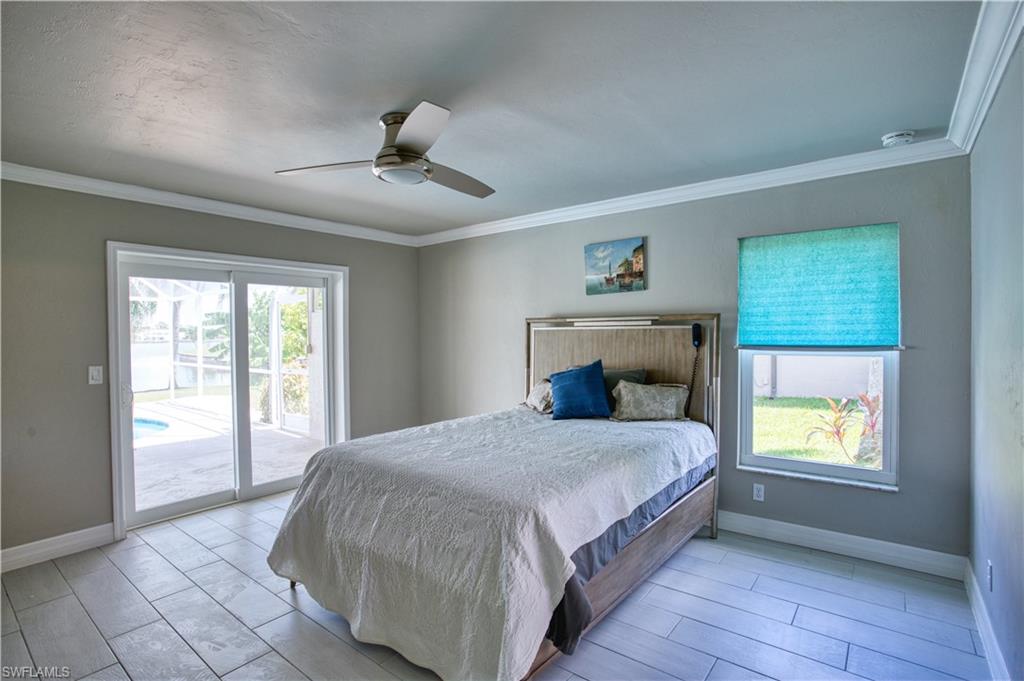 Master bedroom views to pool lanai and lake