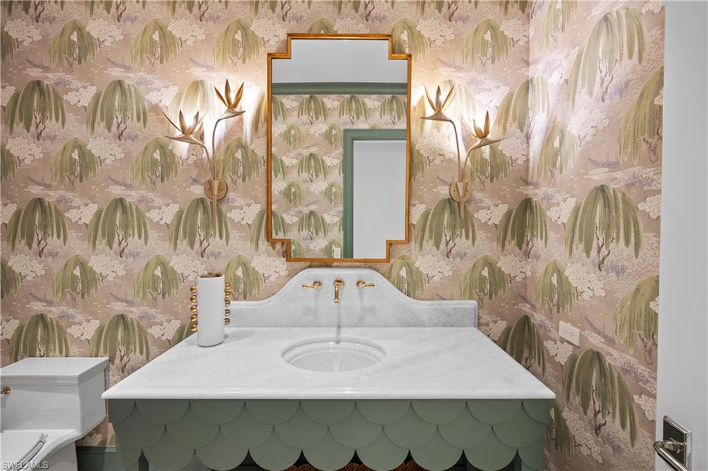 Bathroom featuring toilet and sink