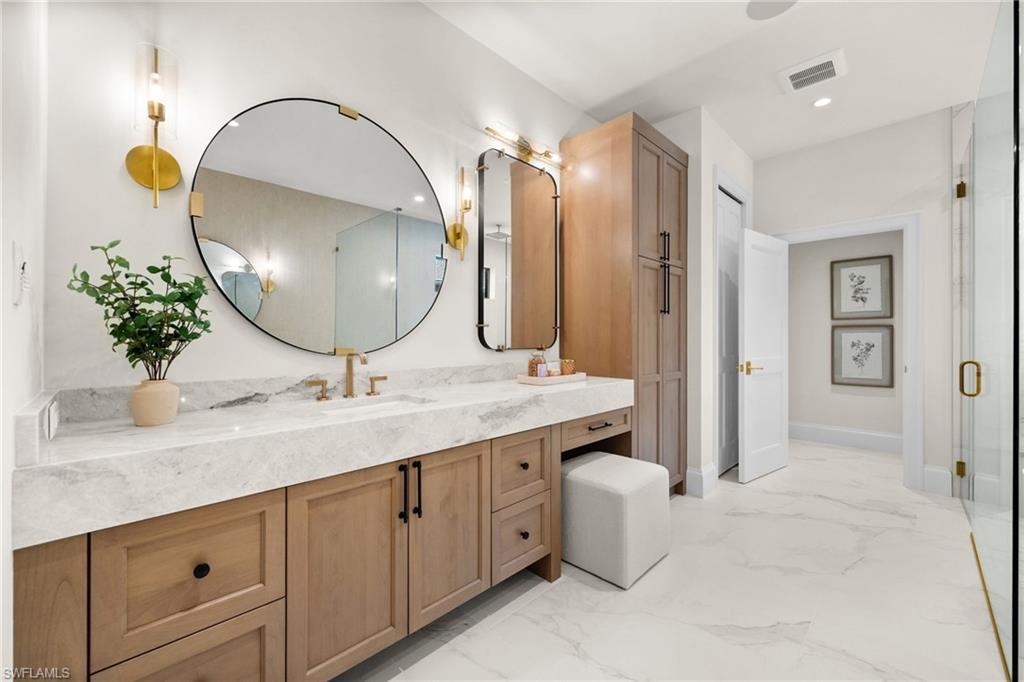 Dreamy master bathroom vanity, upgraded Taj Majal countertops, separate water closet