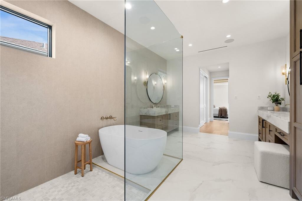 Upgraded Walker Zanger accent tile wall
