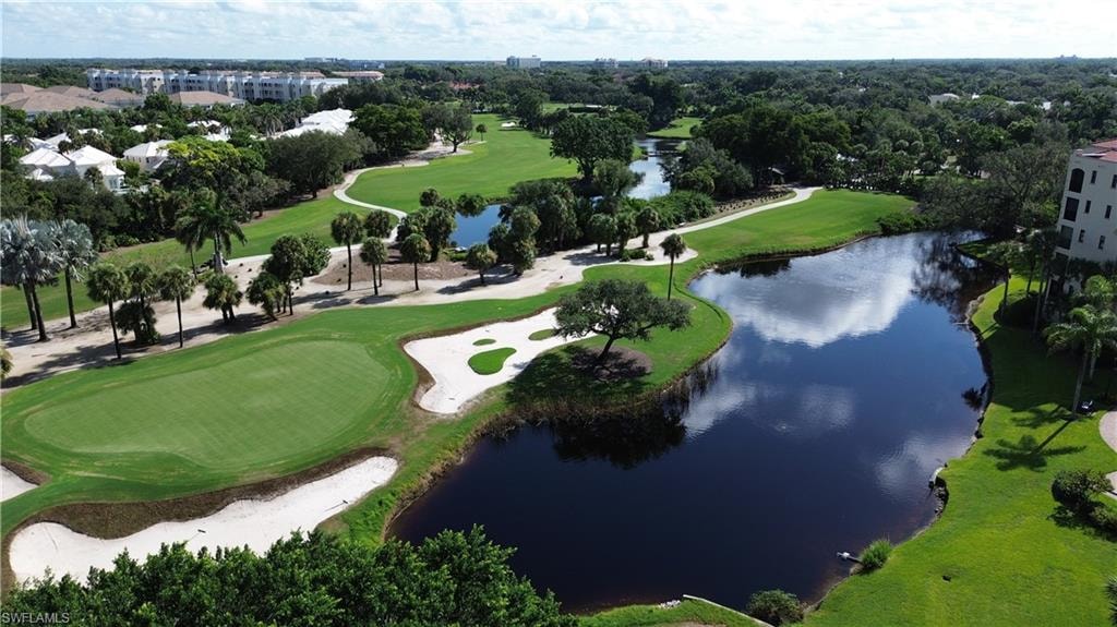 Aerial view of a local golf course and a large body of water