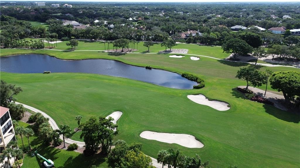 Aerial view of a nearby body of water and a local golf course