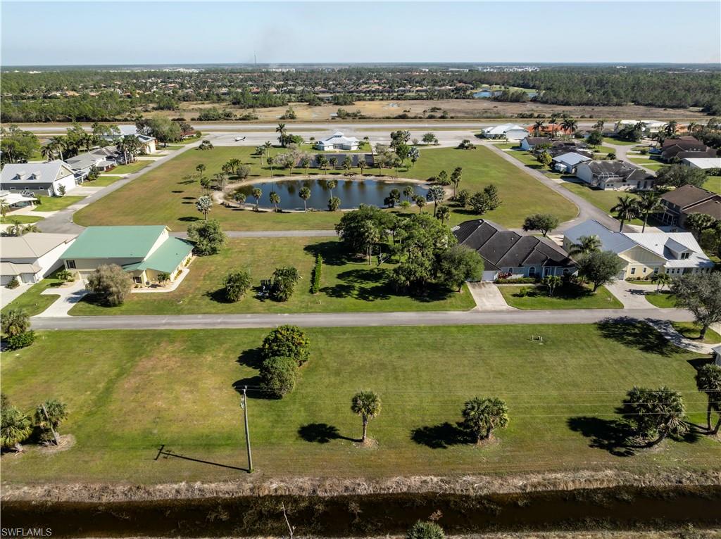 View looking East to Taxiway & Runway