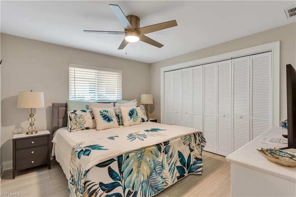 Bedroom with a closet and ceiling fan