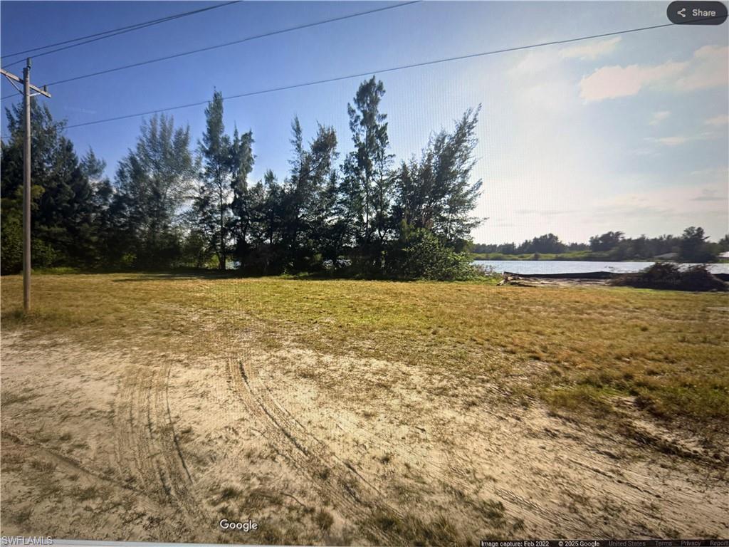 View of yard featuring a water view