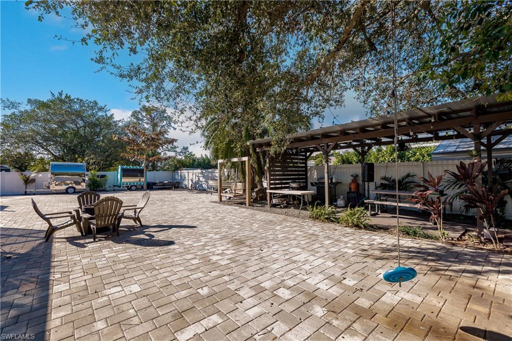 View of patio with a pergola