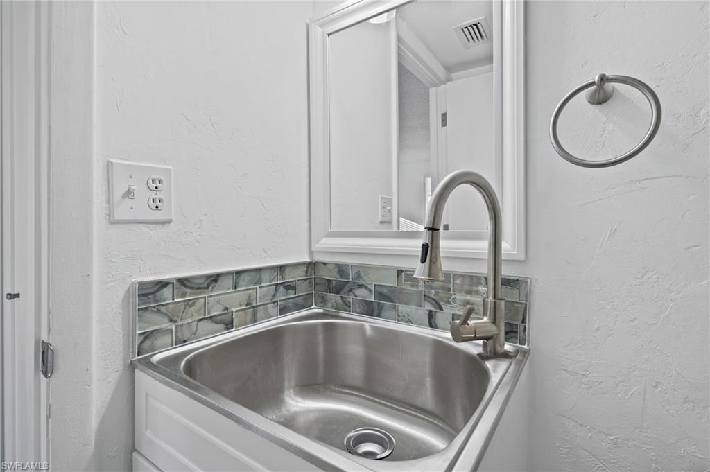 Room details featuring sink. First Floor Bathroom