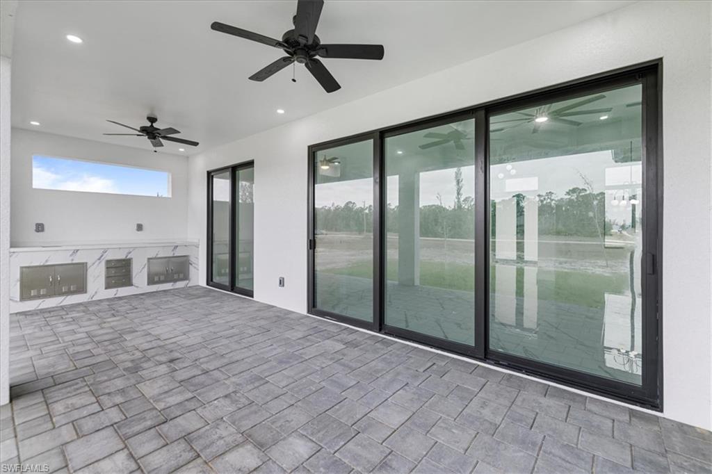 View of patio / terrace featuring ceiling fan