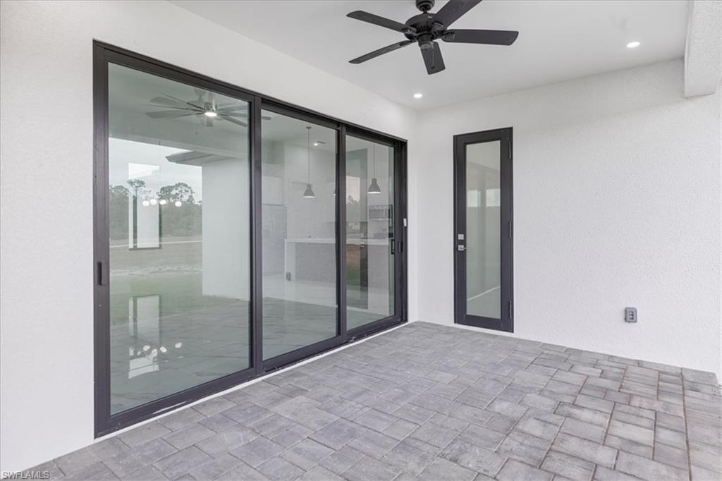 View of patio / terrace featuring ceiling fan