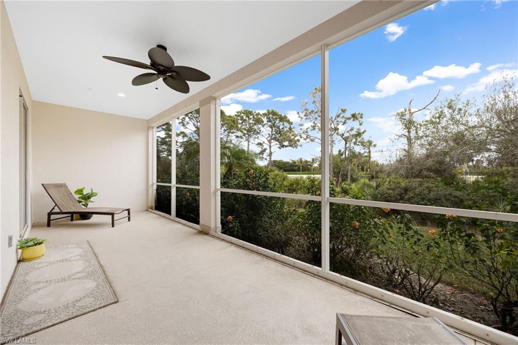 Sunroom featuring ceiling fan