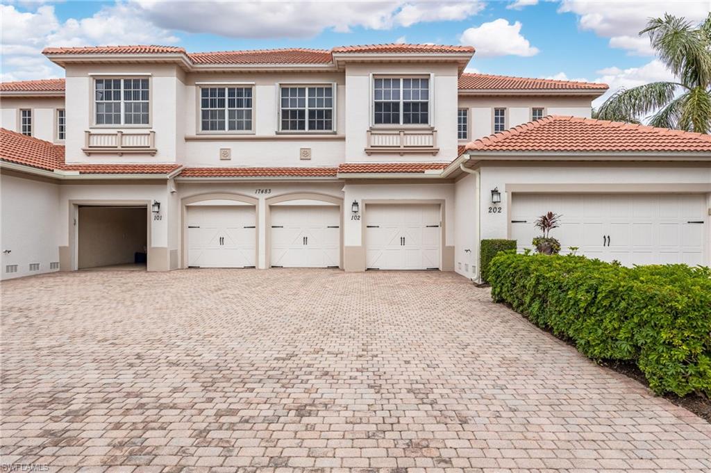 Mediterranean / spanish-style house with a garage