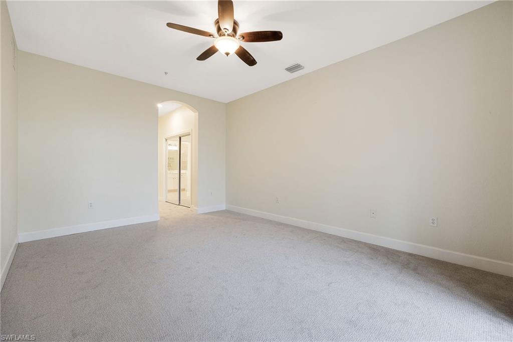 Unfurnished room featuring ceiling fan