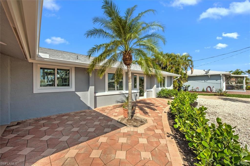 View of front facade featuring a patio area