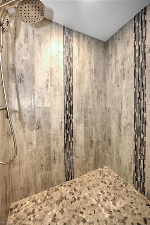 Bathroom with tiled shower