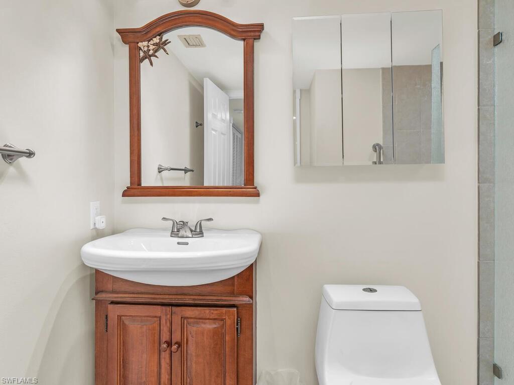 Bathroom with vanity and toilet
