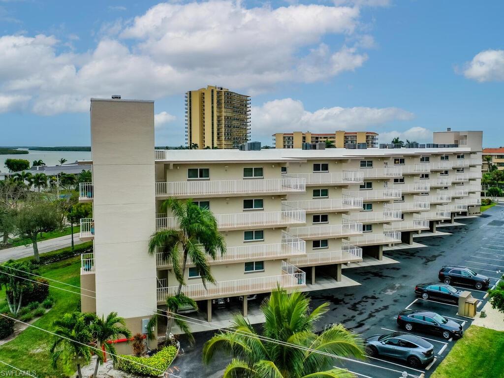 View of building exterior featuring a water view