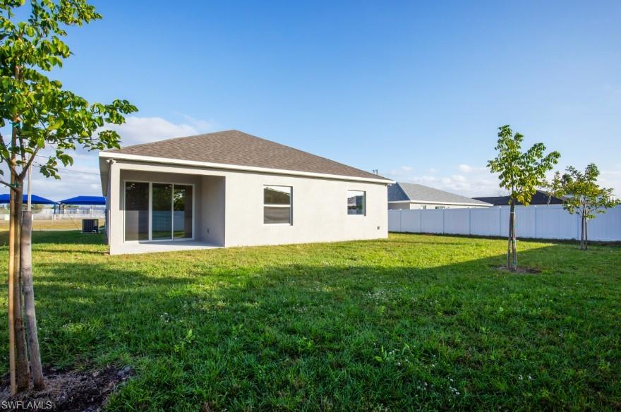 Covered Lanai and Spacious Backyard