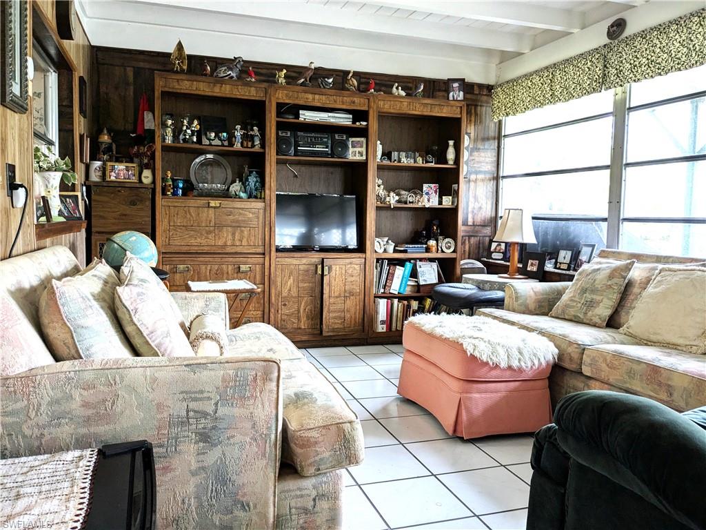 Tiled  room with beam ceiling