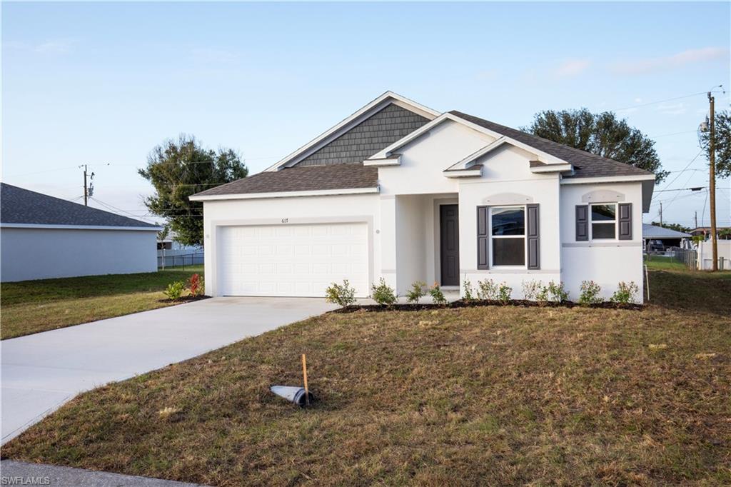 View of front of house featuring stucco siding, driveway, an attached garage, and roof with shingles