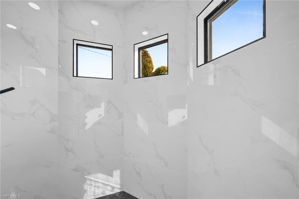 Bathroom with a tile shower