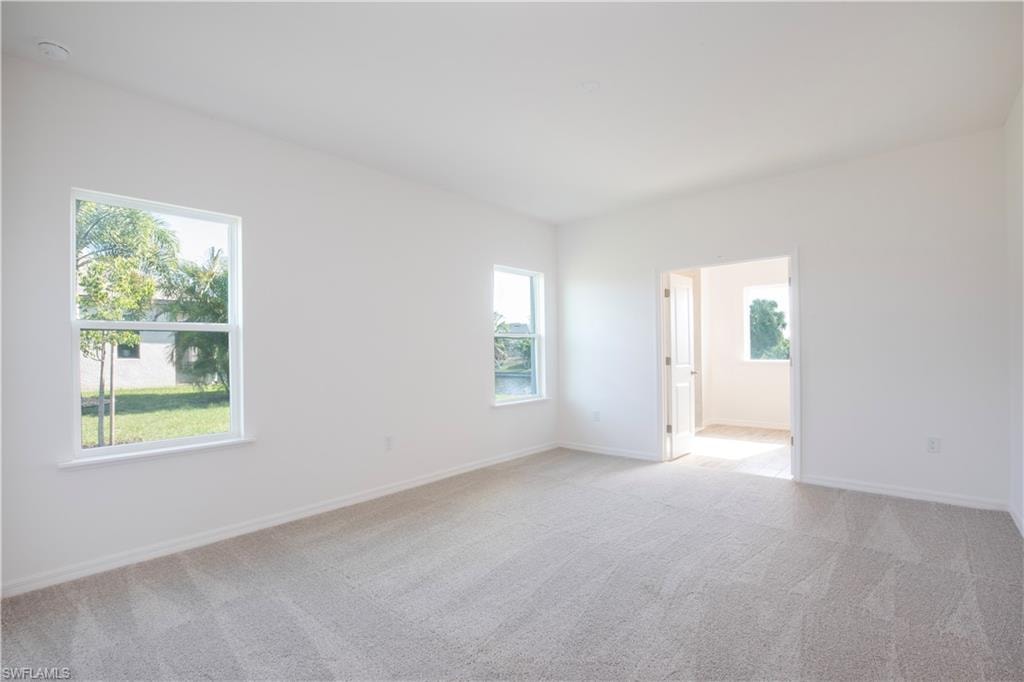 Unfurnished room featuring carpet floors