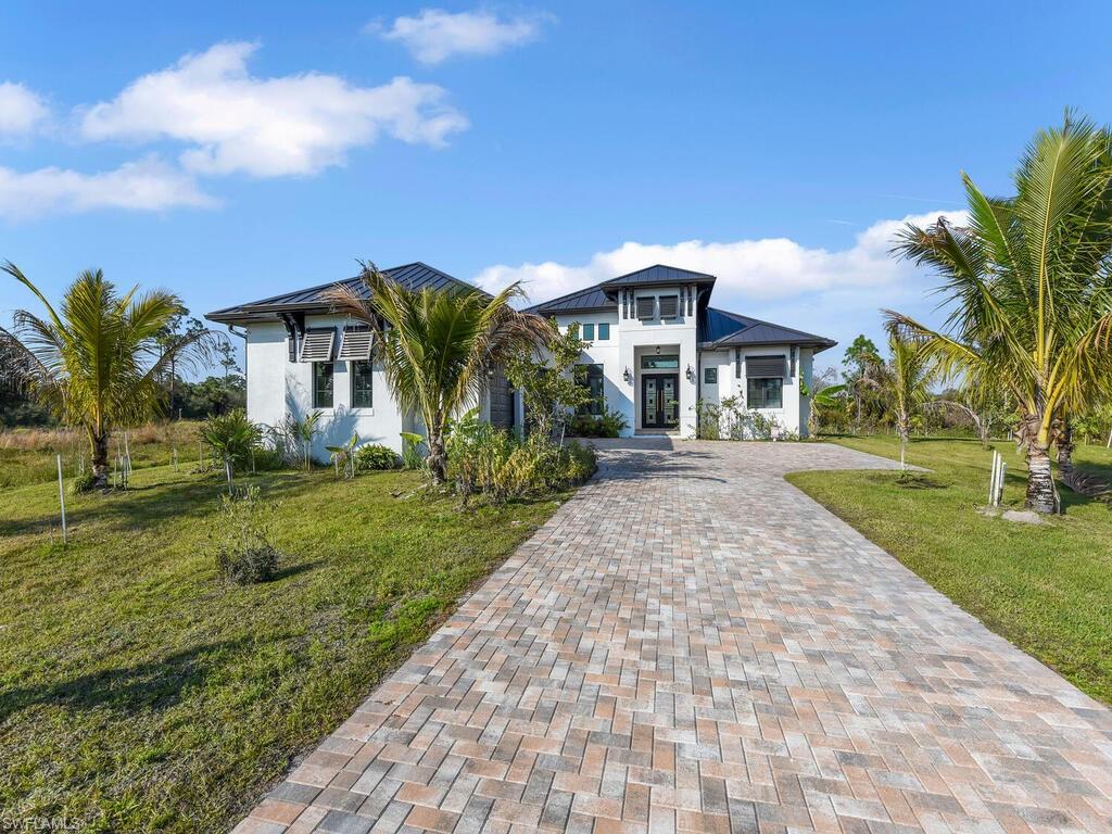 View of front of home featuring a front yard