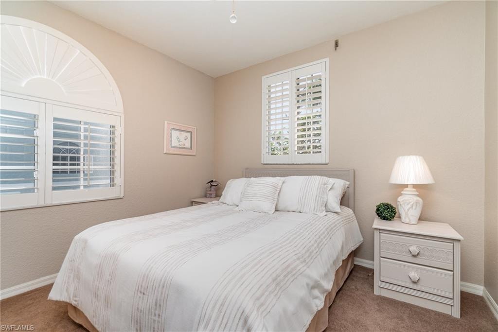 Bedroom featuring carpet