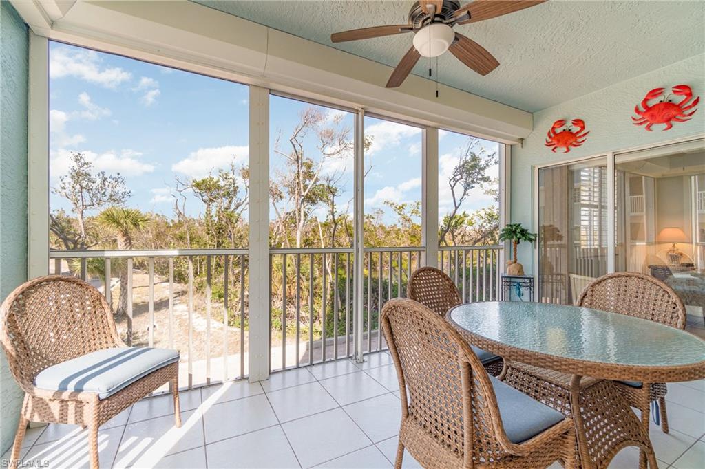 Screened and tiled lanai overlooking canal and preserve (w/ Electric Shutters)