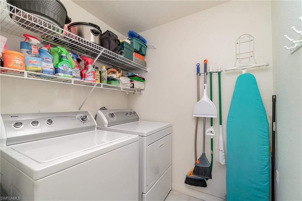 Laundry area featuring independent washer and dryer